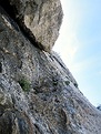 Looking up at the begining of the polished crack of the crux pitch.